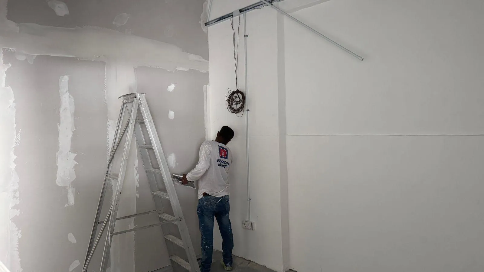 Aircon indoor unit bracket and wall sleeve penetration ready for piping connection